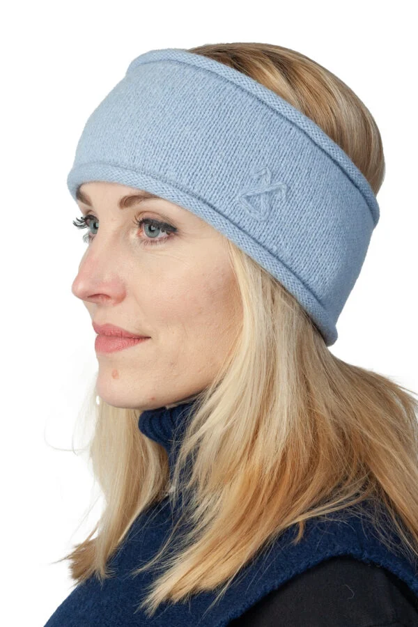 Stirnband aus Wolle mit Fleecefutter und Fruchtbarkeitssymbol – Babyblau