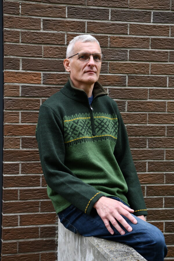 Wool men's pullover with short zipper and power symbols