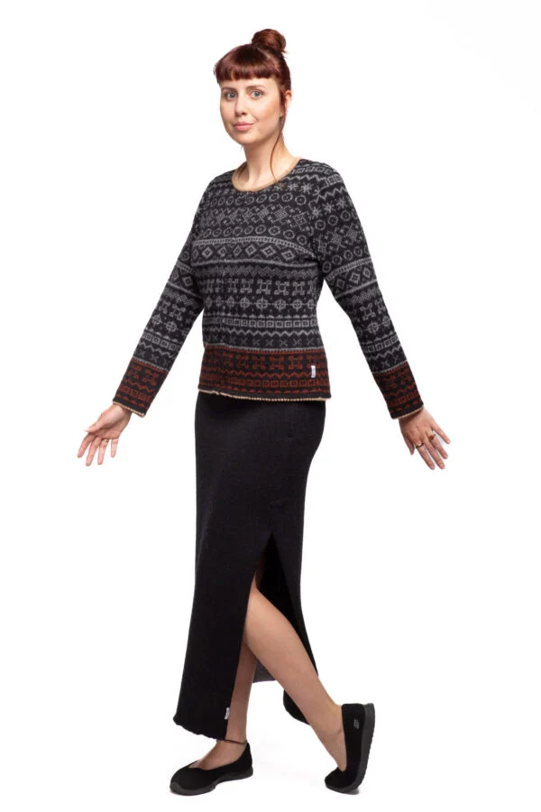 Short wool cardigan with power symbols and a zipper