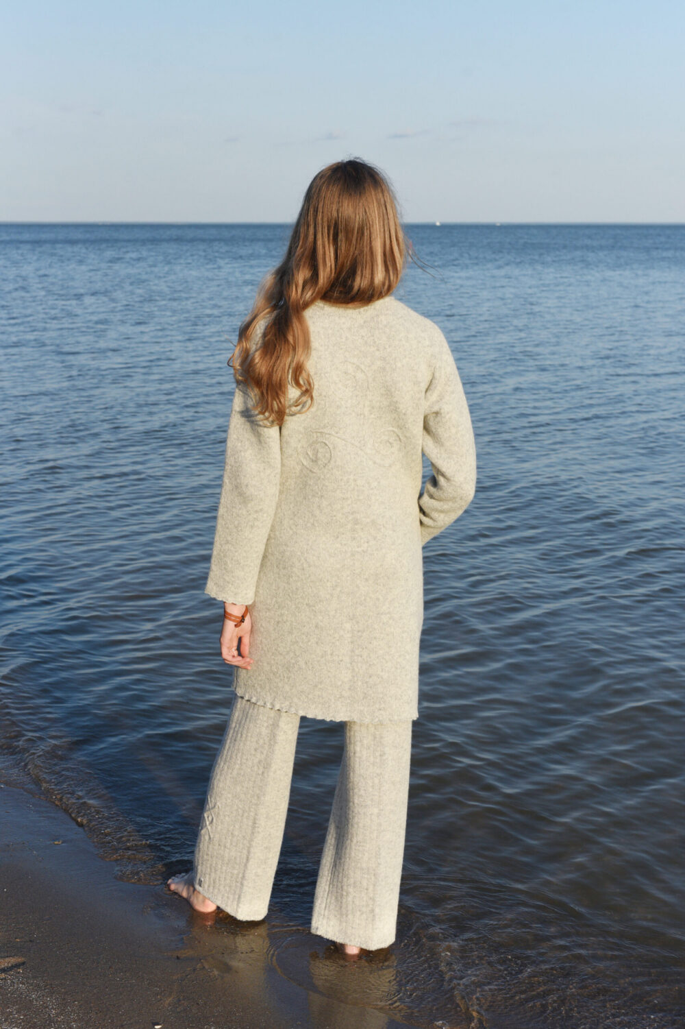 Long wool cardigan with power symbols and a pocket - Image 4