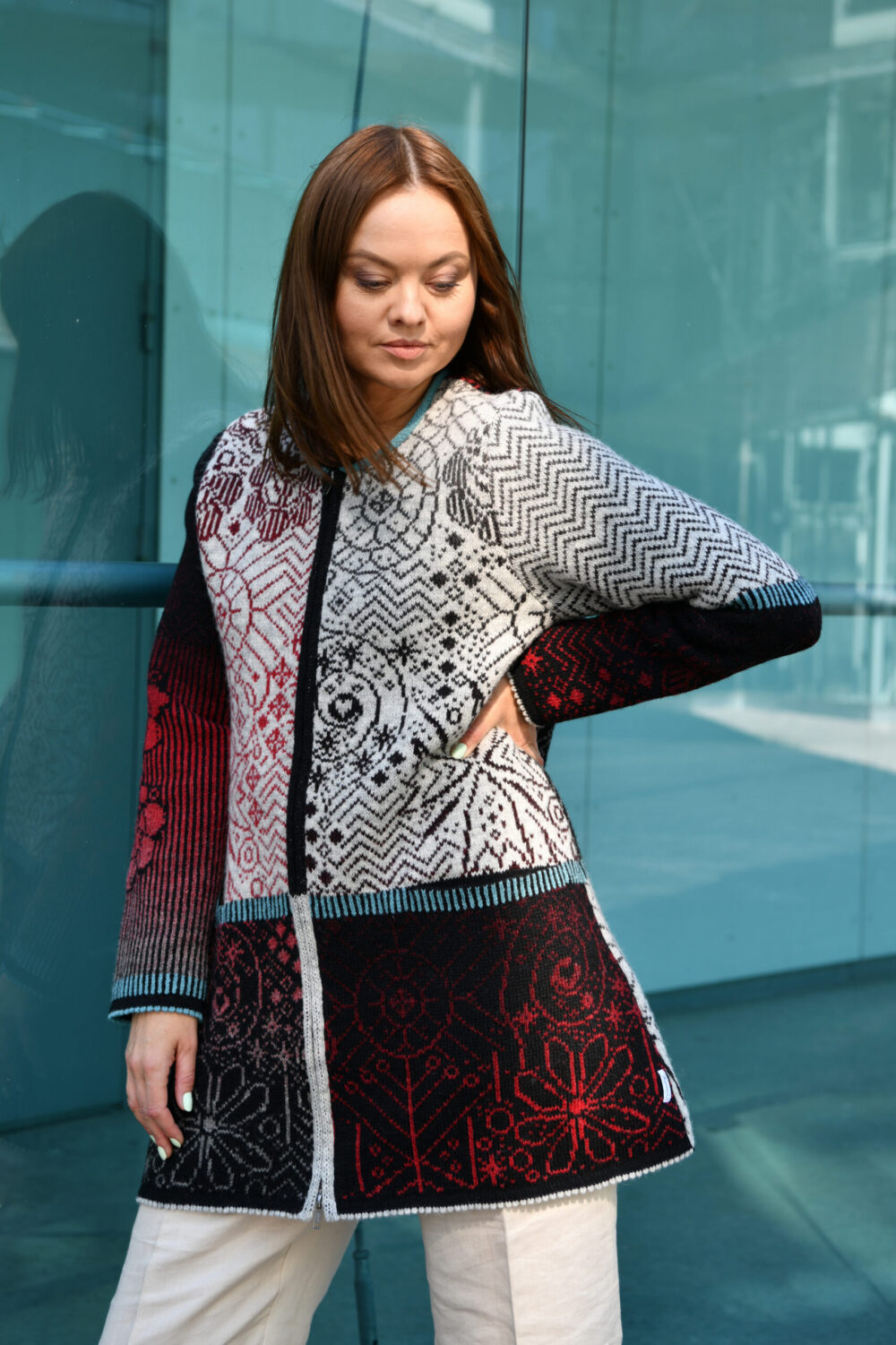woman wearing wool cardigan with protective signs