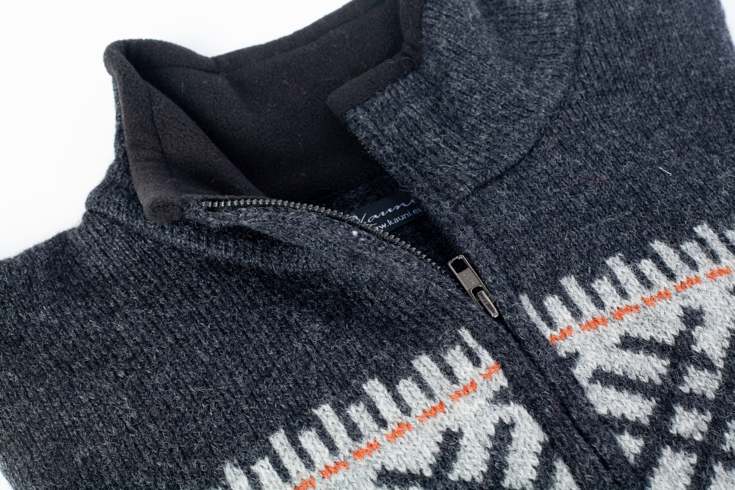 a close-up detail of a grey wool cardigan for men