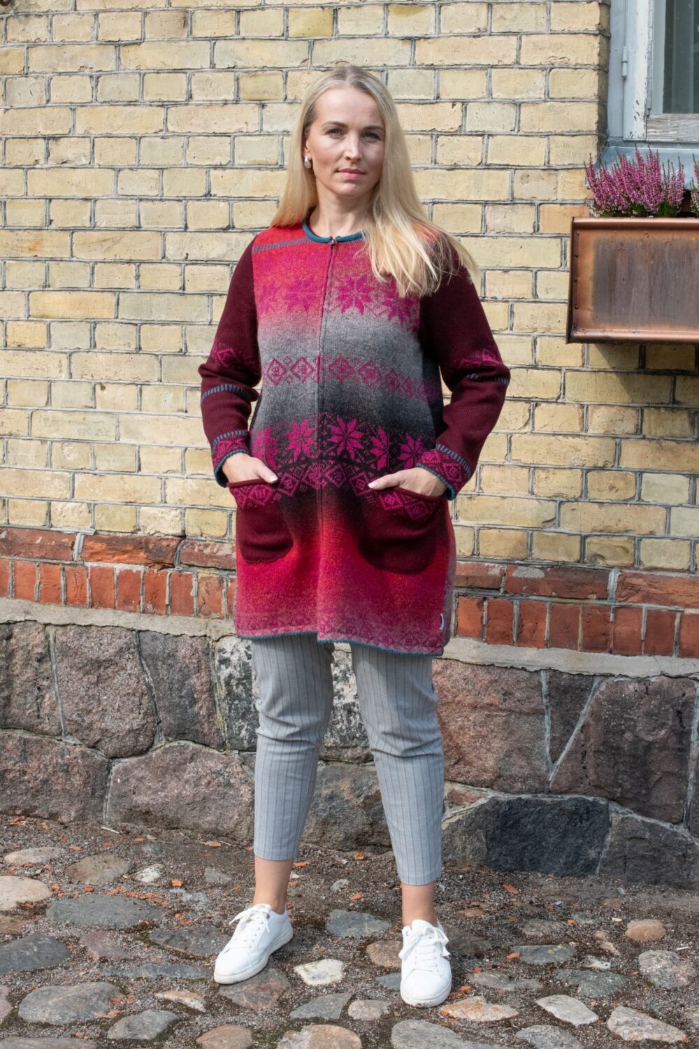 A-lined medium length cardigan with power symbols - Image 1