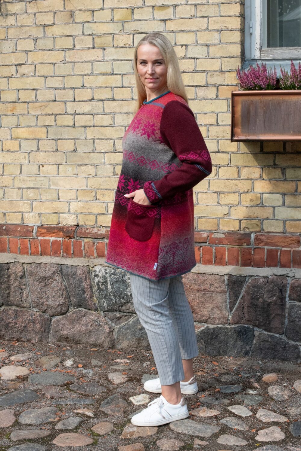 A-lined medium length cardigan with power symbols - Image 2