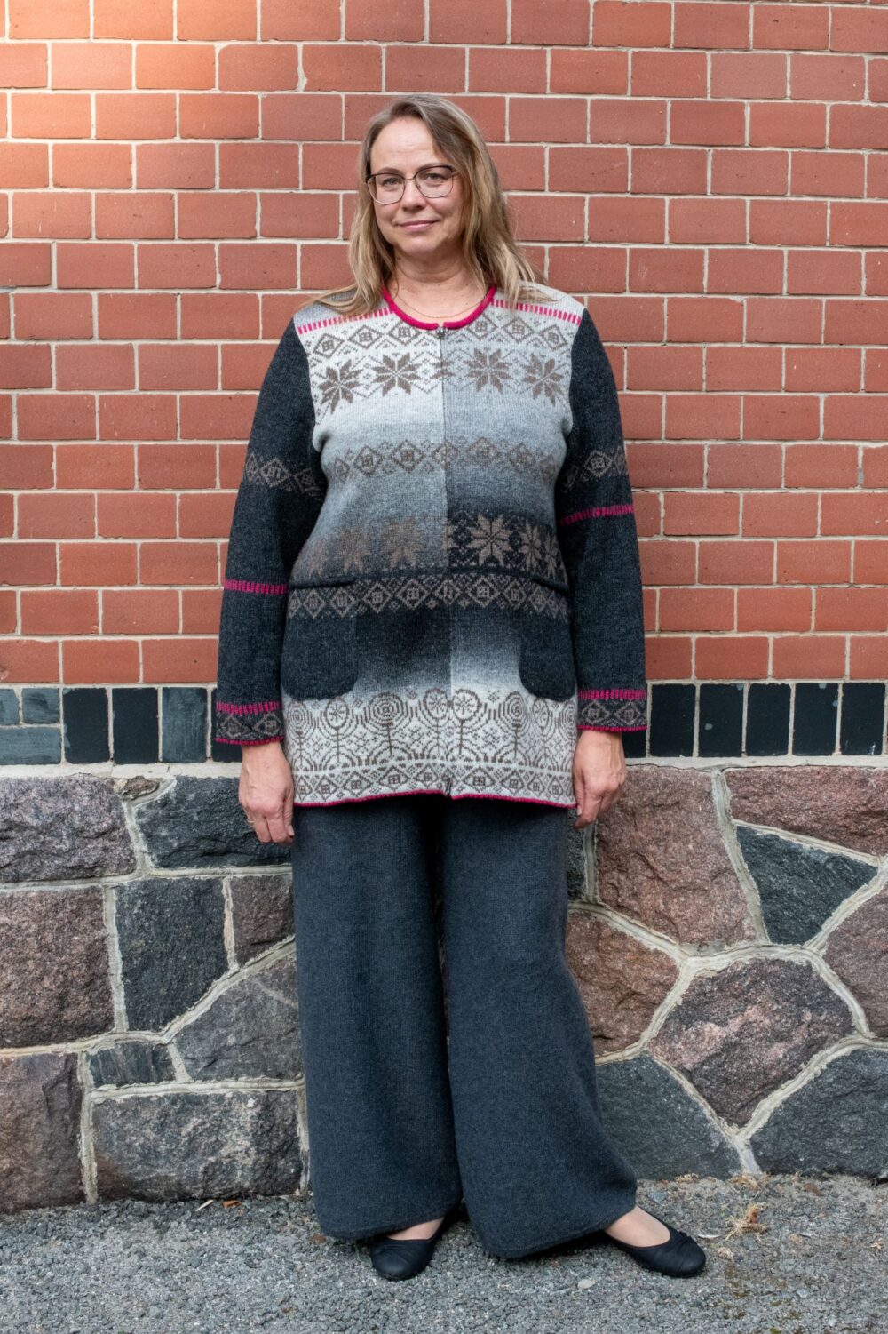 A-lined medium length cardigan with power symbols - Image 1