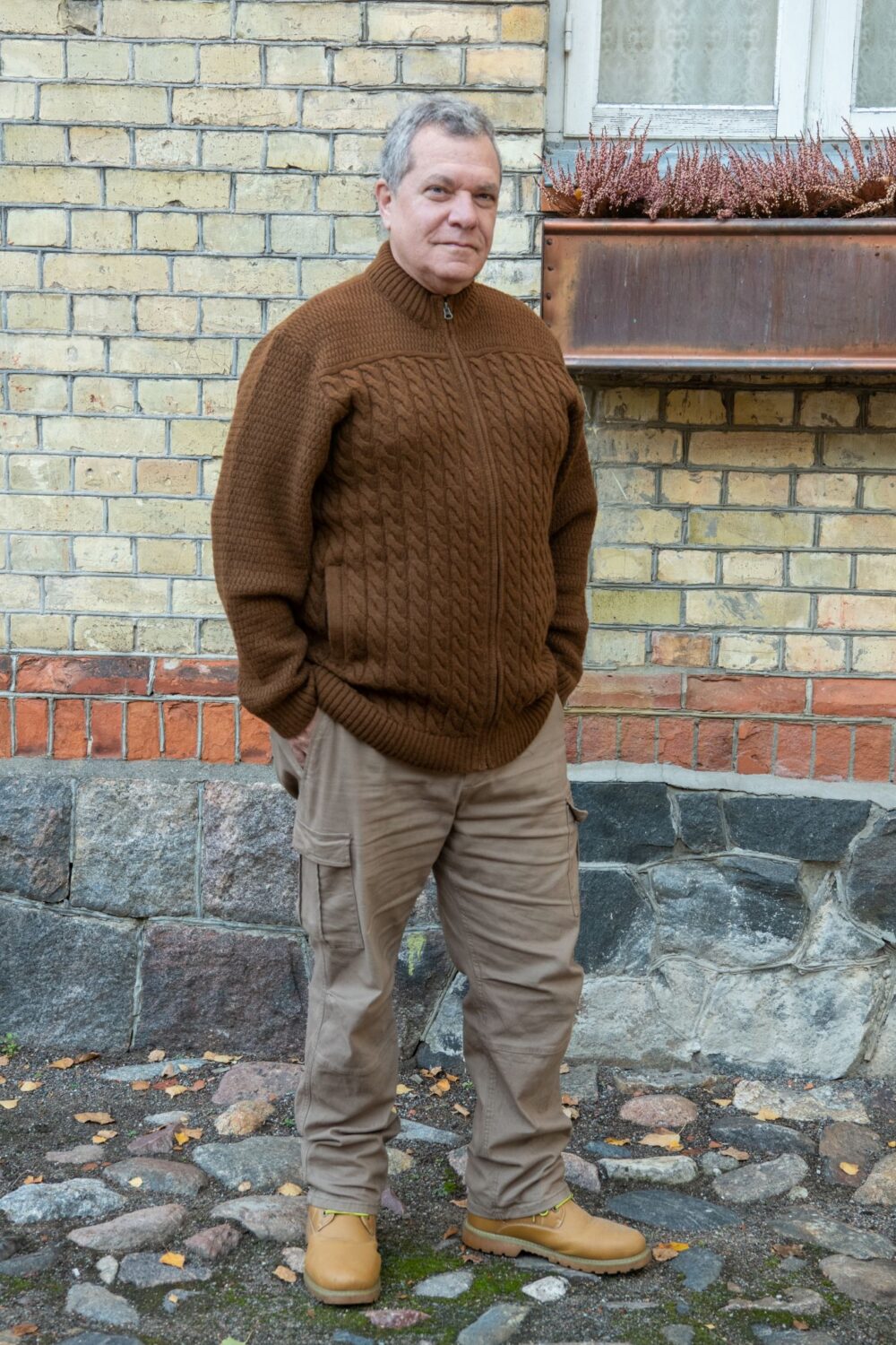 KAU_6721 Men’s cardigan with cables, inner pockets, and power symbol on back - Image 1