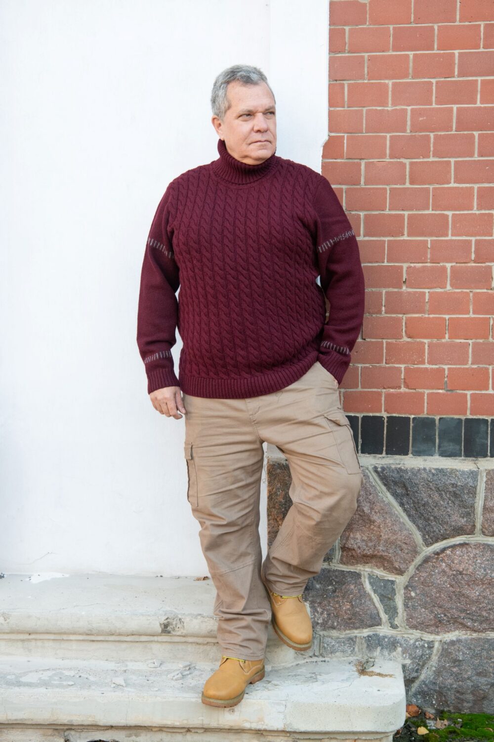 Men’s pullover with cable pattern and hidden message on sleeve - Image 1