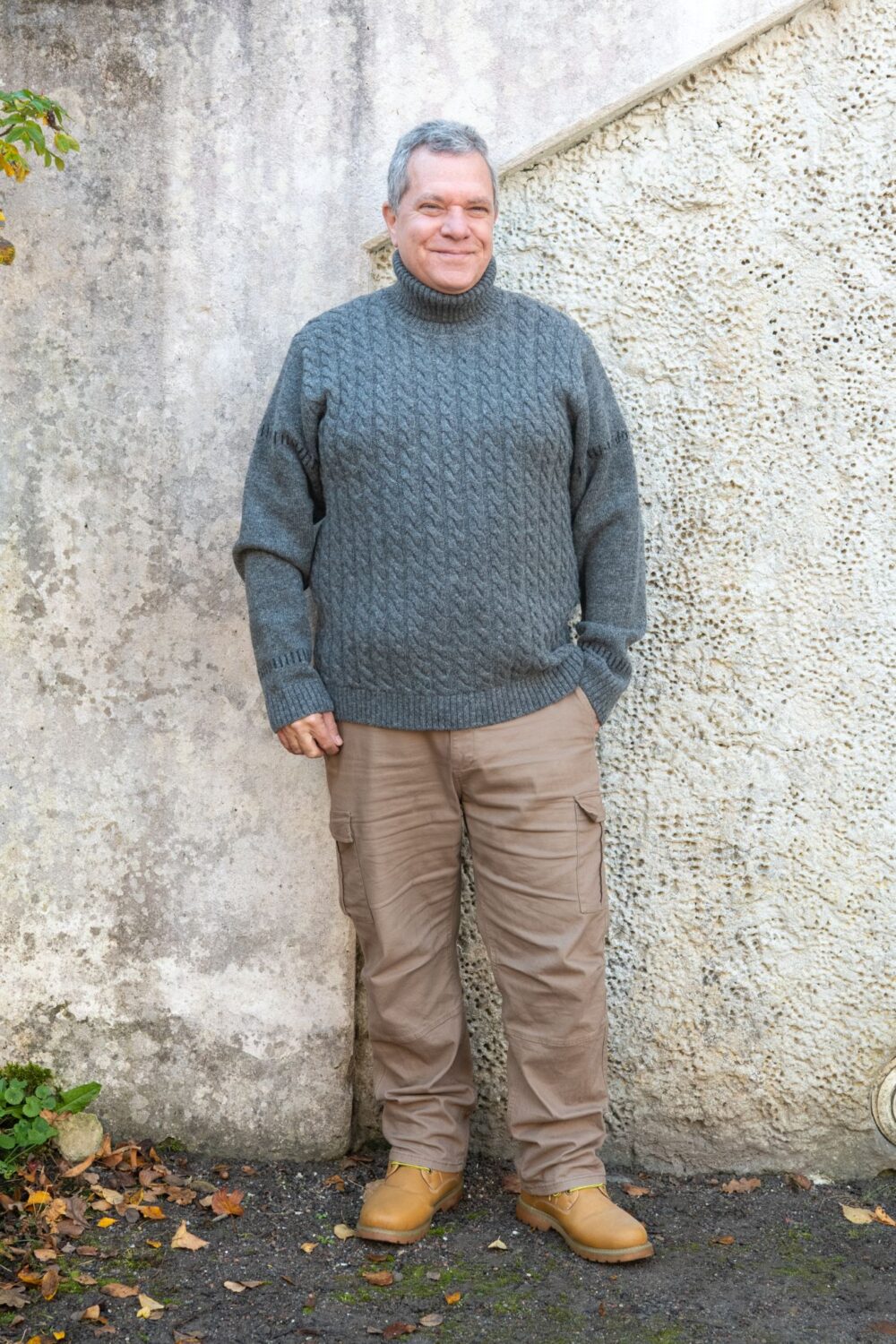 Men’s pullover with cable pattern and hidden message on sleeve - Image 1