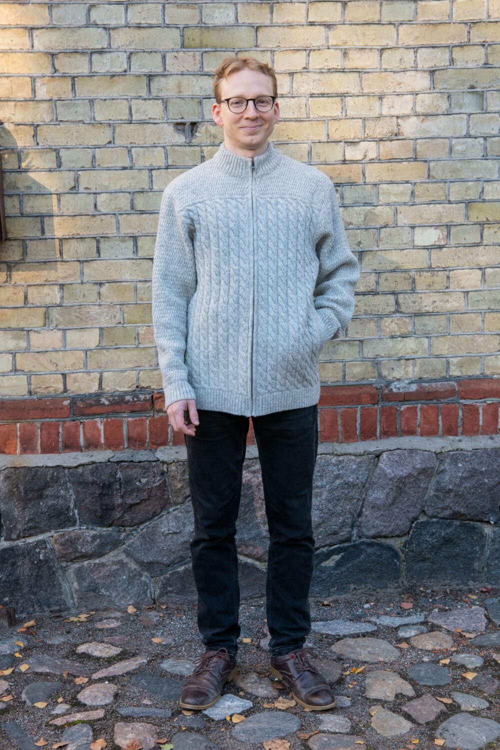 mens cardigan Men’s cardigan with cables, inner pockets, and power symbol on back - Image 1