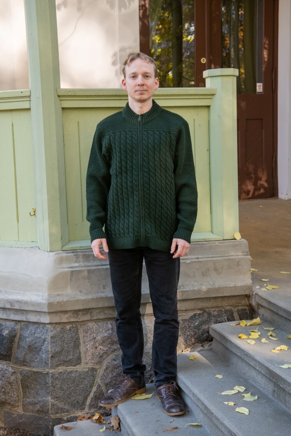 Men’s cardigan with cables, inner pockets, and power symbol on back - Image 2